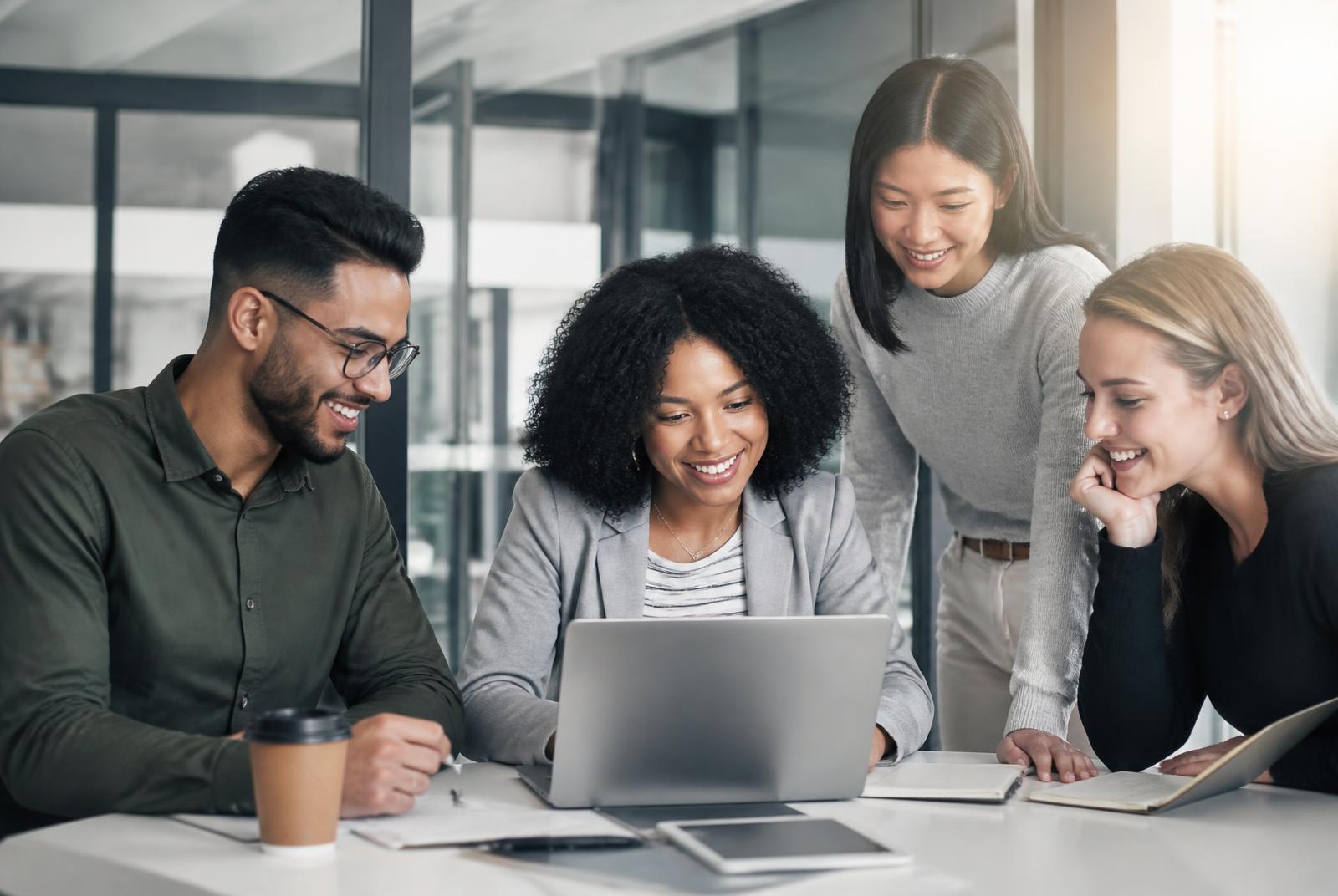 A small business team reviewing their brand campaign on a tablet